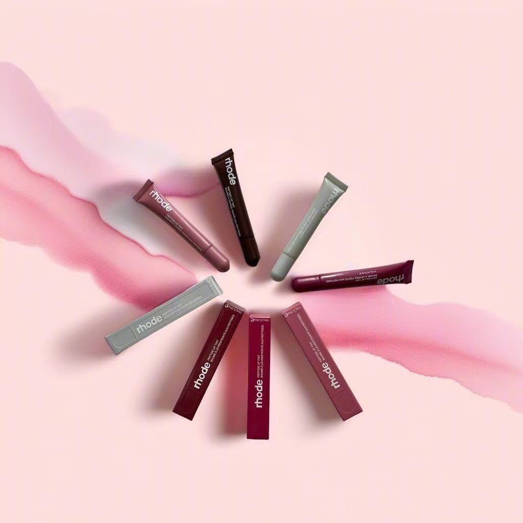 Close-up of Rhode Gloss Lip Tint Toast's glossy finish
