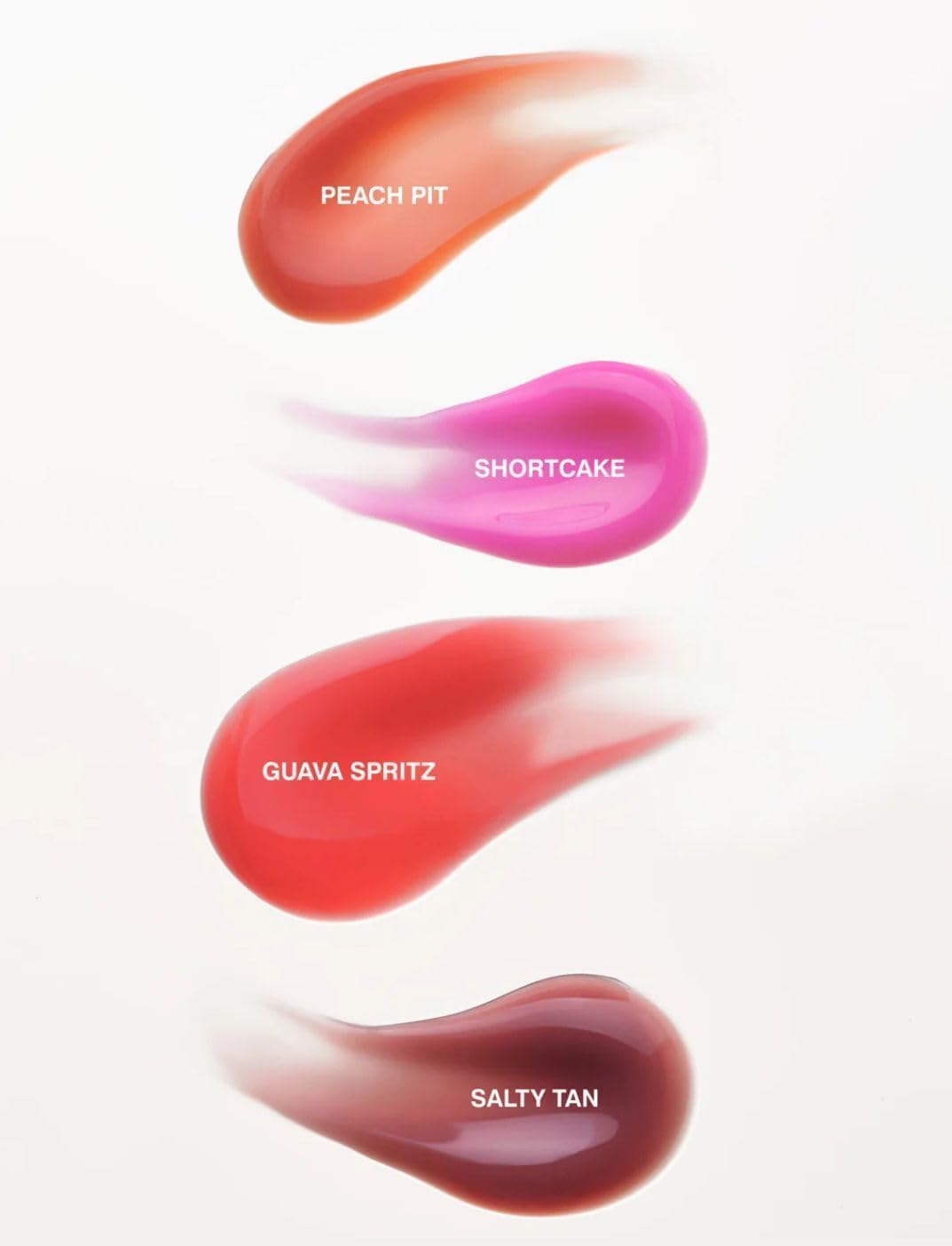 Highlighting hydration as Rhode Gloss Lip Tint Toast nourishes lips