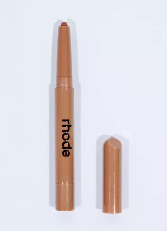 Rhode Peptide Lip Shape Lunge swatch on lips showing contoured color and hydration