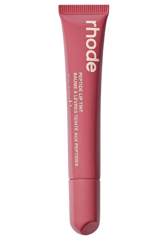 Rhode Peptide Lip Tint Salty Tan bottle provides glossy hydration with a subtle tint.