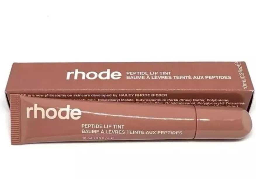 Rhode Peptide Lip Tint tube close-up shows a sheer, hydrating gloss.