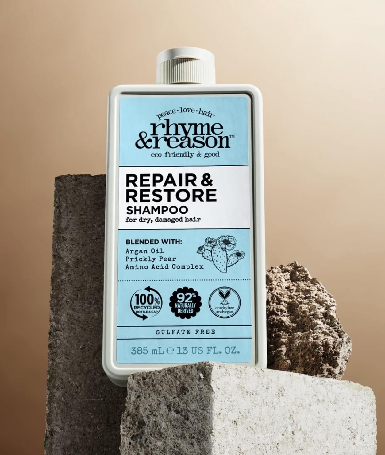 Rhyme & Reason Repair & Restore conditioner bottle ready to detangle and soften.