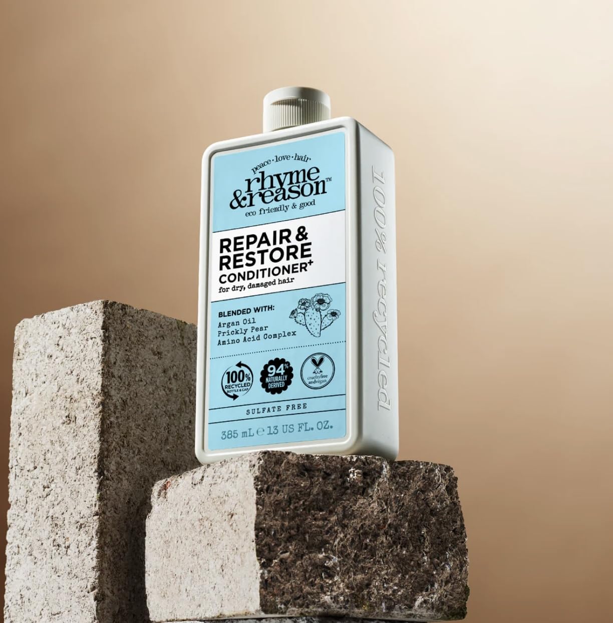 Rhyme & Reason Repair & Restore shampoo label highlights natural ingredients.