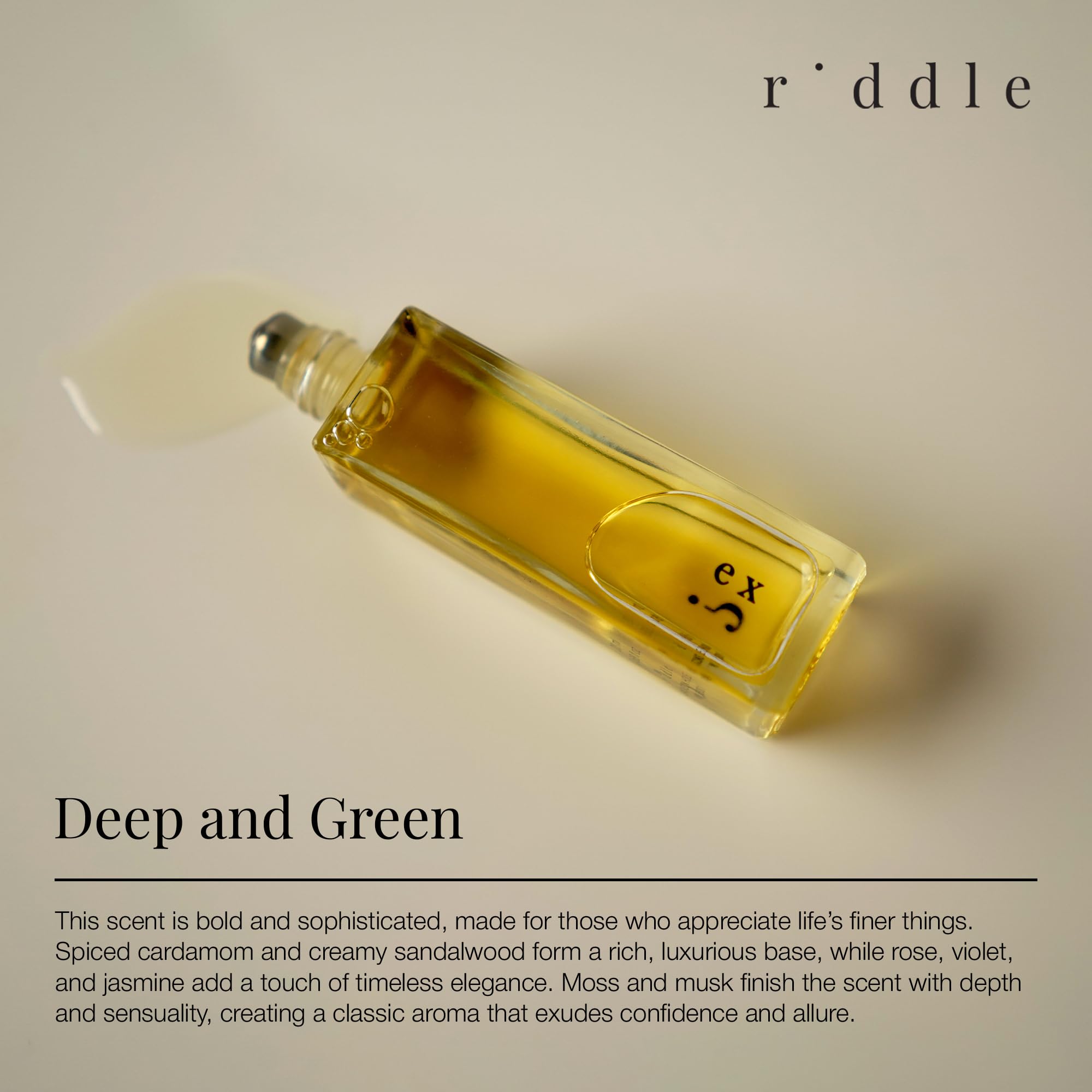 Riddle Ex Roll-On skin-safe label emphasizes vegan and alcohol-free formula.