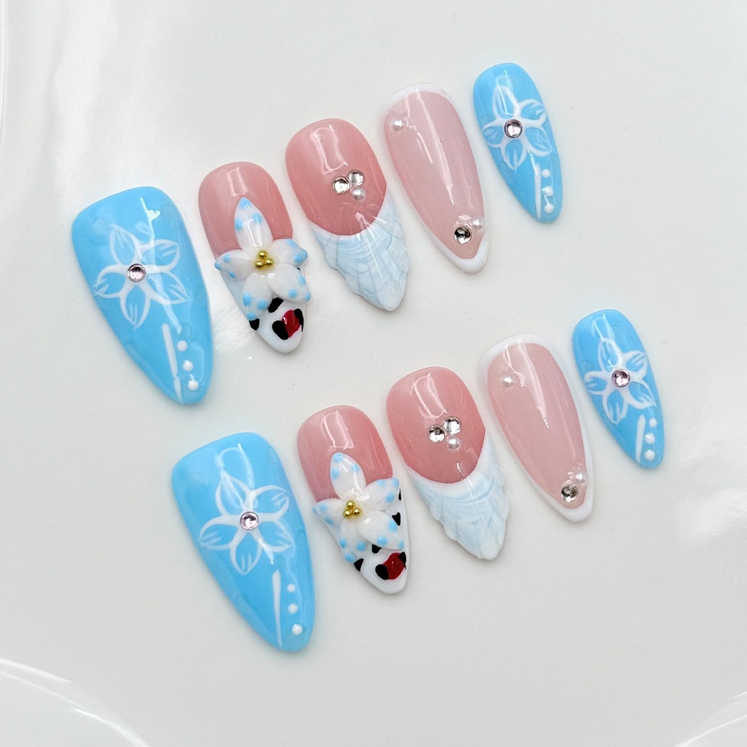 RIICFDD blue French almond press-on nails kit for lasting manicures.