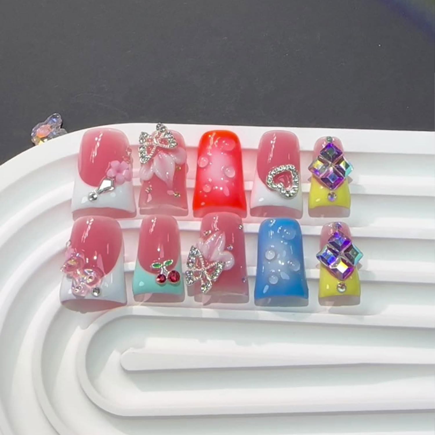 RIICFDD complete kit with 10 nails, glue, cuticle stick for custom fit.