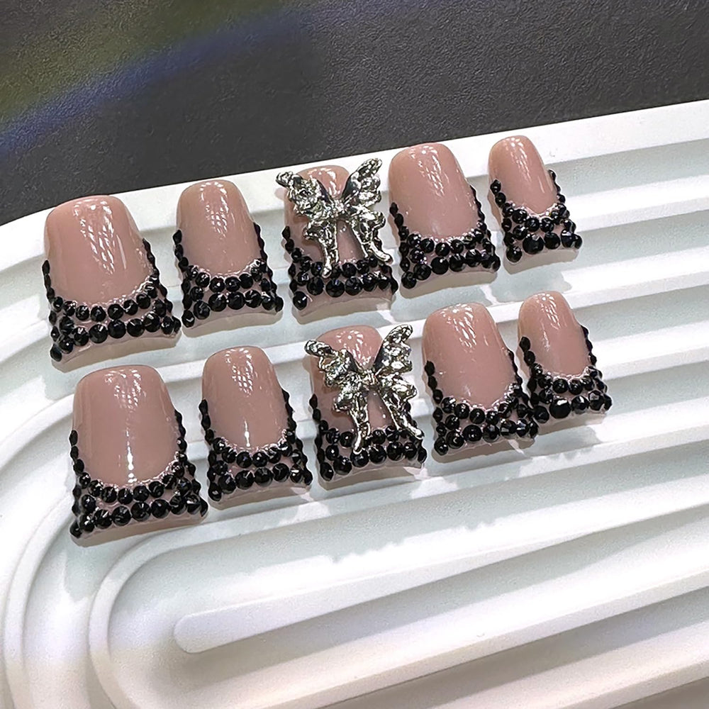 RIICFDD complete kit with glue and cuticle stick supports quick at-home nails.