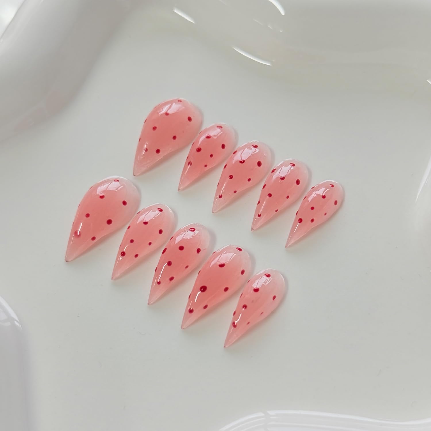 RIICFDD complete kit includes 10 nails, glue, cuticle stick, and travel pouch