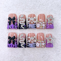 RIICFDD duck 3D nails with bow and stars for an elegant party look.