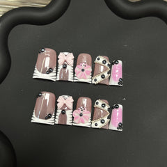 RIICFDD duck press-on nails with black rhinestones for a glamorous look