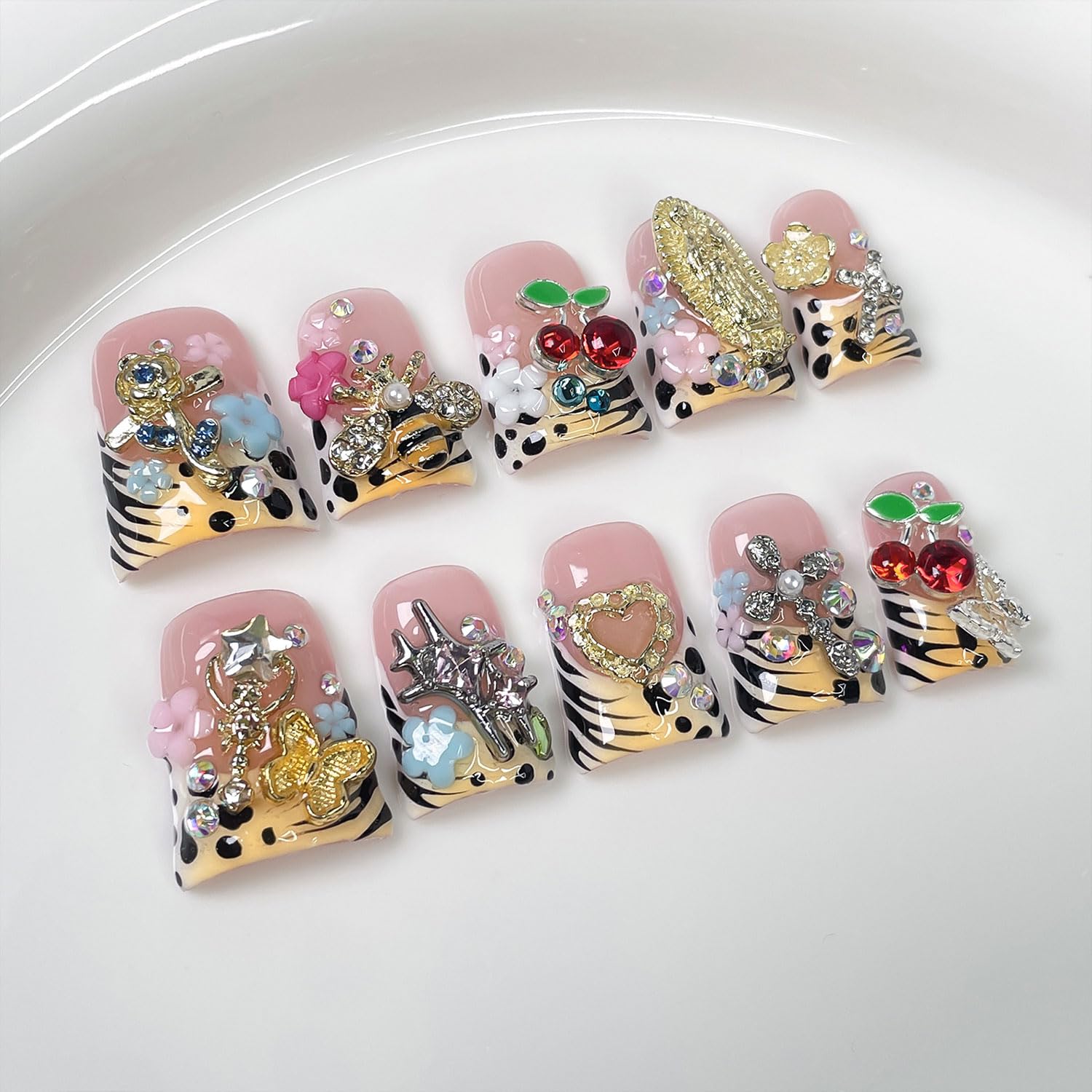 RIICFDD duck press-on nails with French tip and 3D flowers for at-home salon-like manicure.