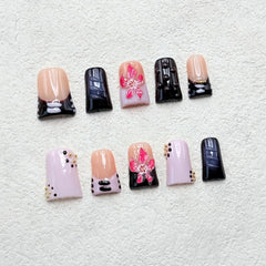 RIICFDD kit contents including nails, glue, cuticle stick, pouch