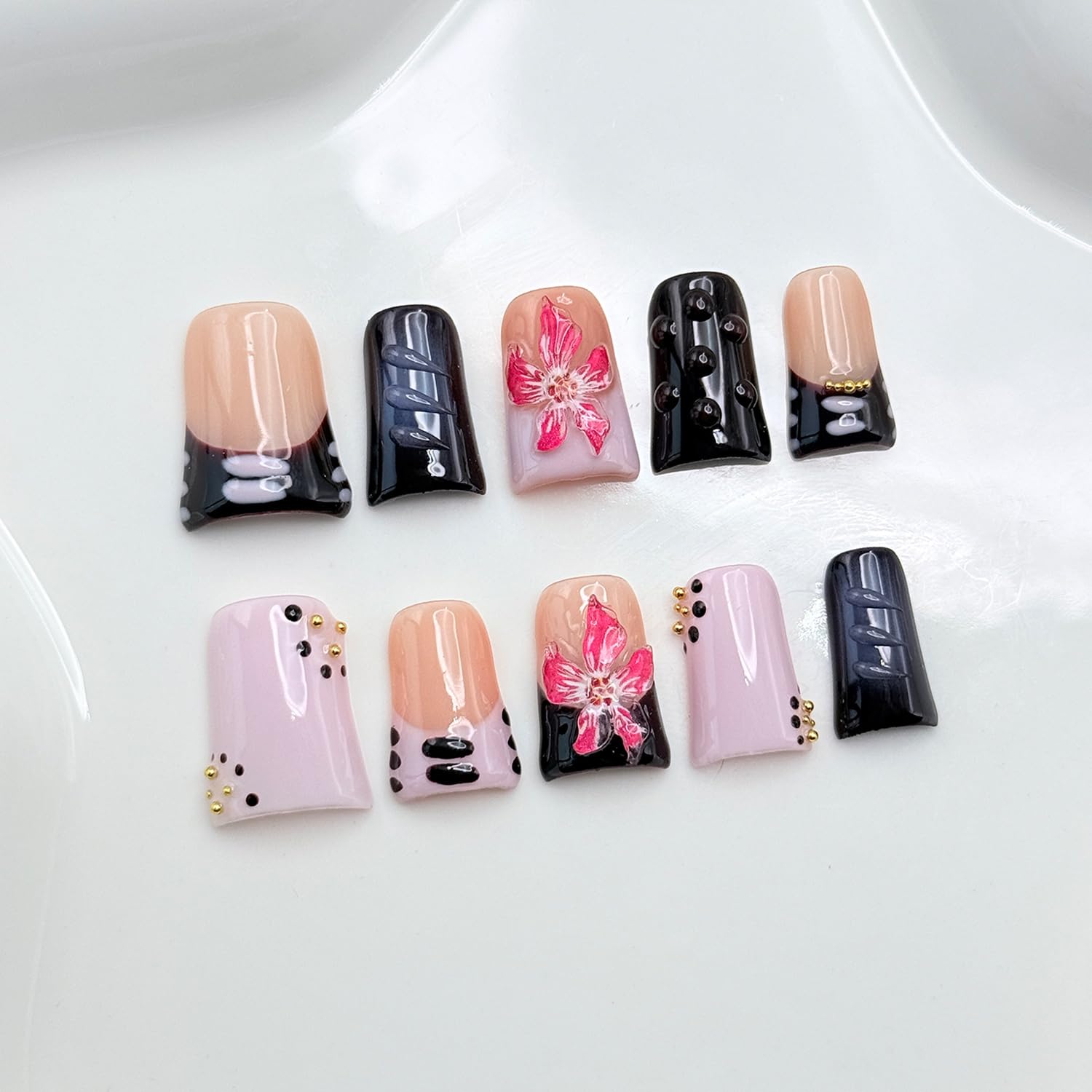 RIICFDD nails worn on hand for natural-length look