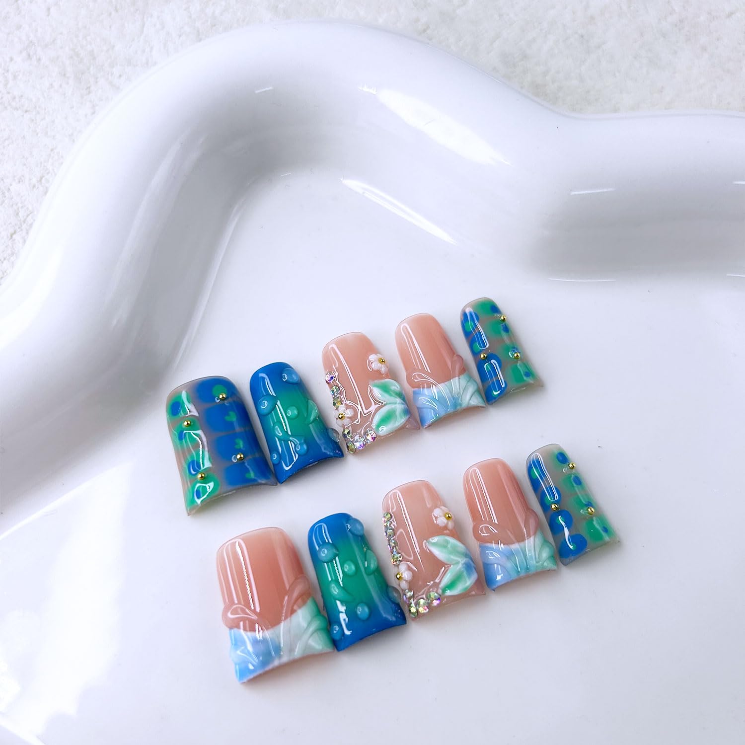 RIICFDD hand-filed nails crafted for a seamless fit on natural nails.
