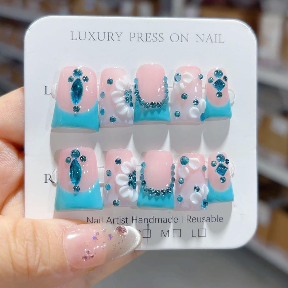 RIICFDD handmade press-on nails with 3D blue rhinestones for a salon-style look.