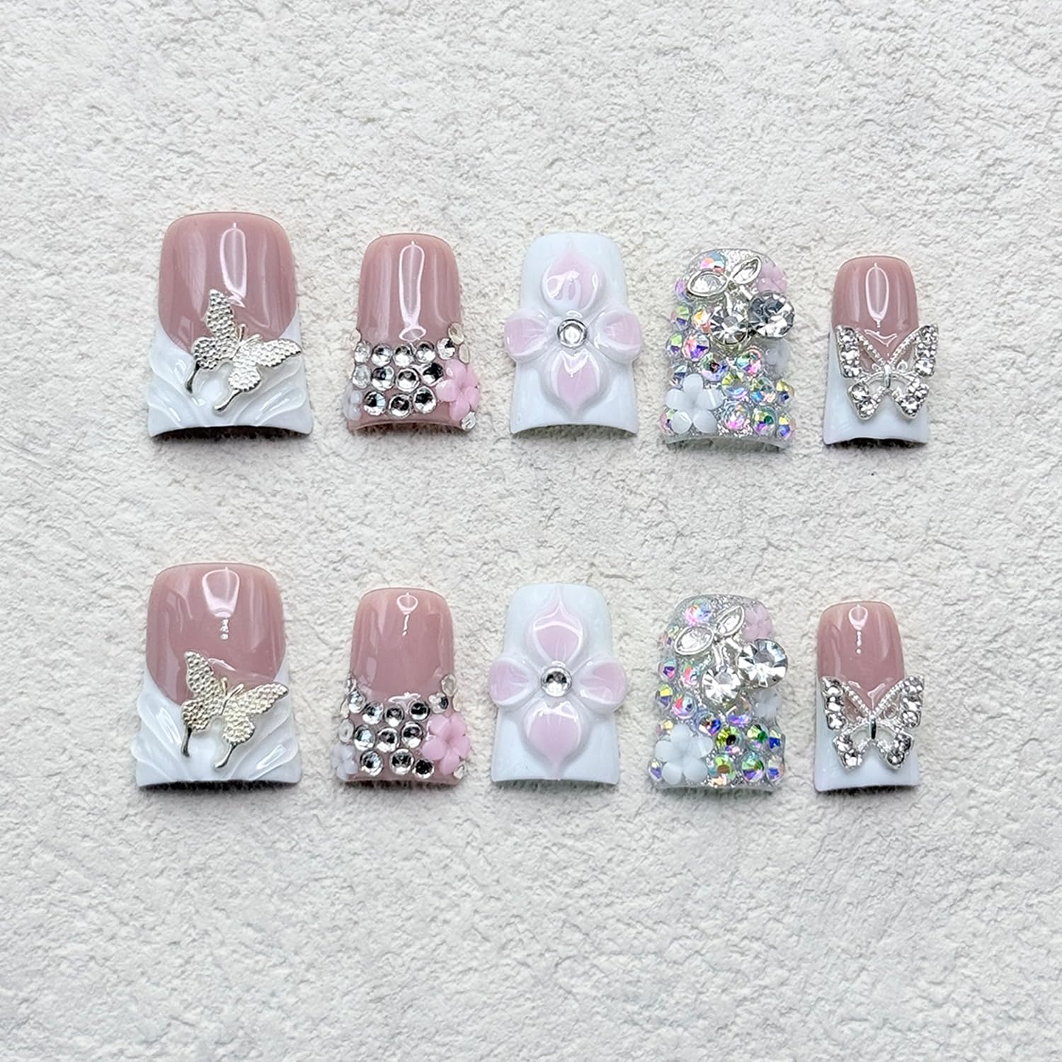 RIICFDD nude pink finish nails offer versatile everyday elegance.
