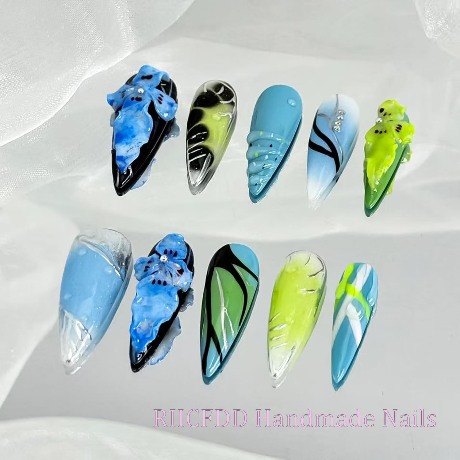 RIICFDD nails next to coin for scale to show size S fit and length