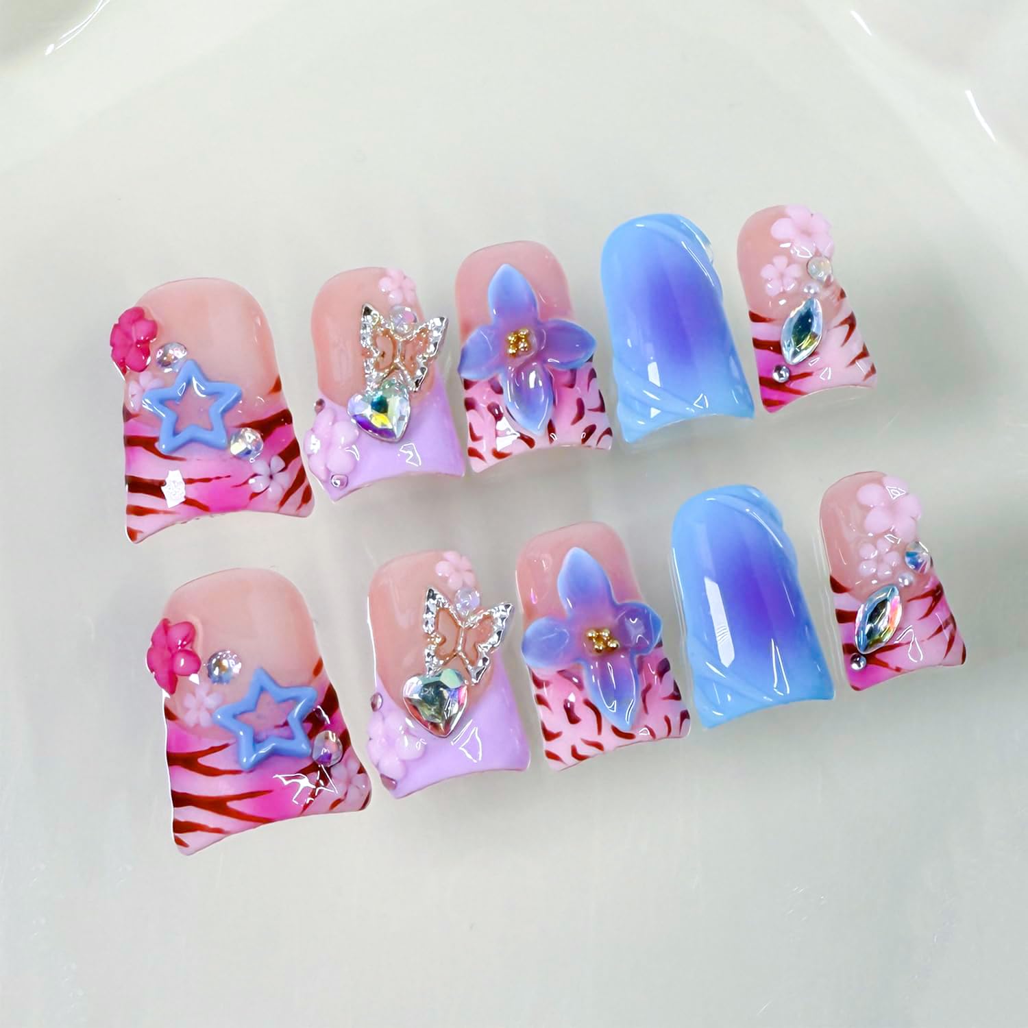 RIICFDD thick press on nails in pink with duck-nails focus for at-home manicure
