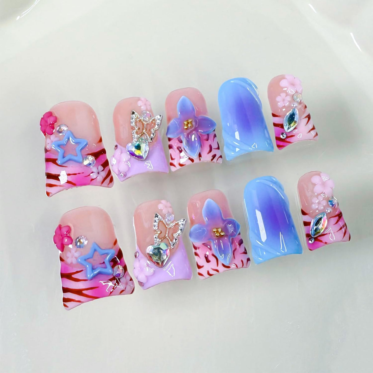 RIICFDD thick press on nails in pink with duck-nails focus for at-home manicure