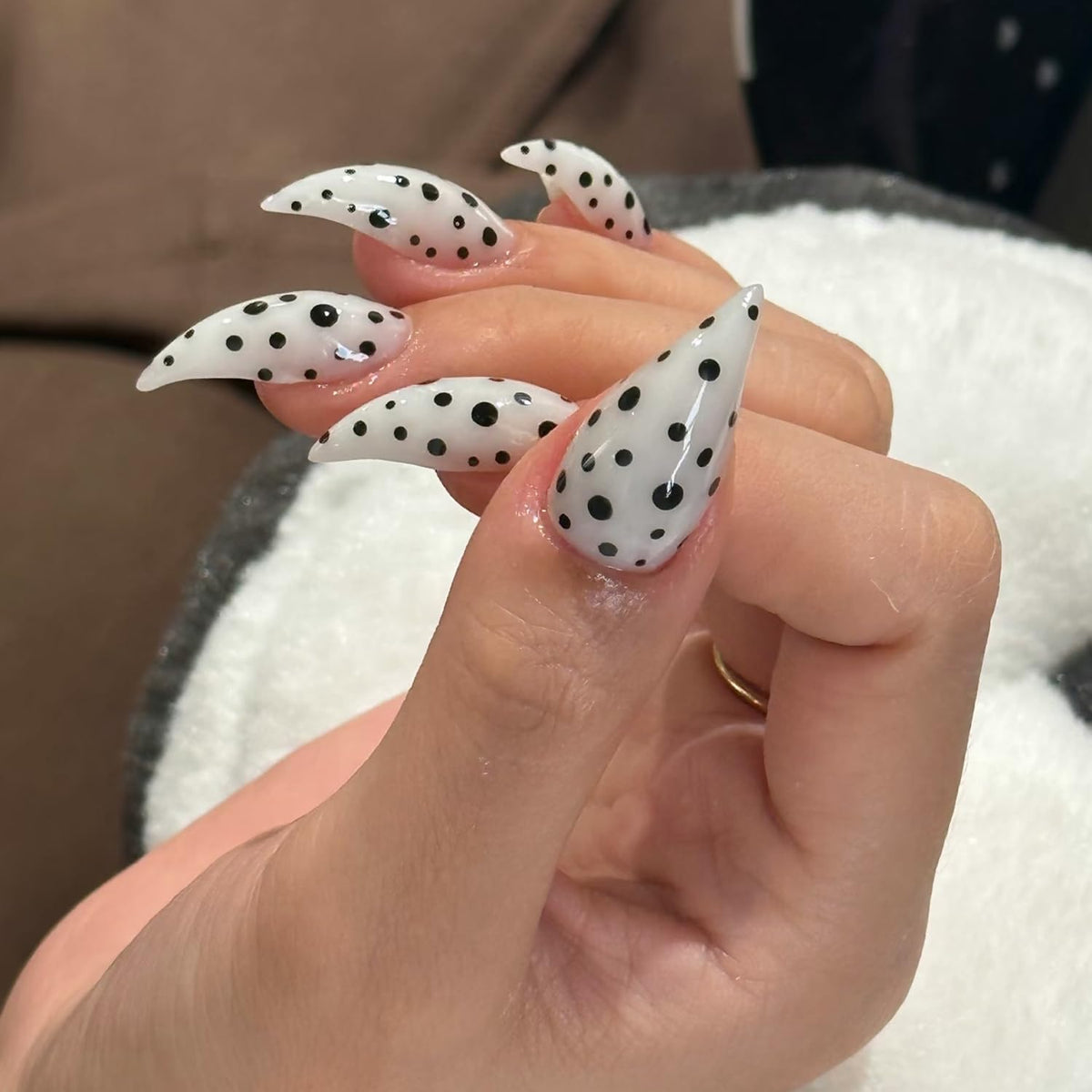 RIICFDD thick press-on nails in white stiletto with polka dots for at-home salon-grade manicure.