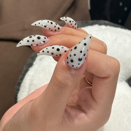 RIICFDD thick press-on nails in white stiletto with polka dots for at-home salon-grade manicure.