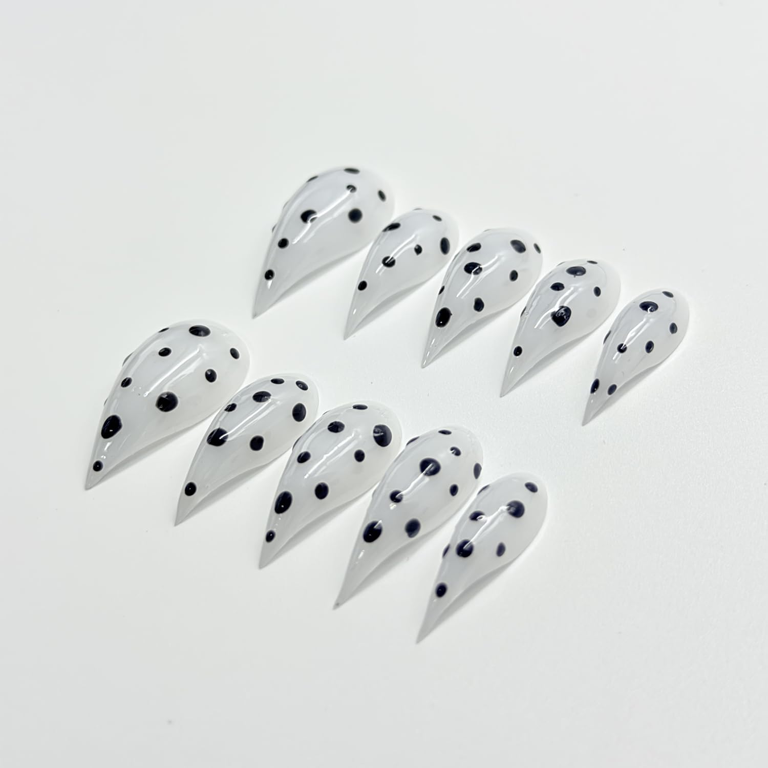 RIICFDD white stiletto nails with curved edges for natural look.