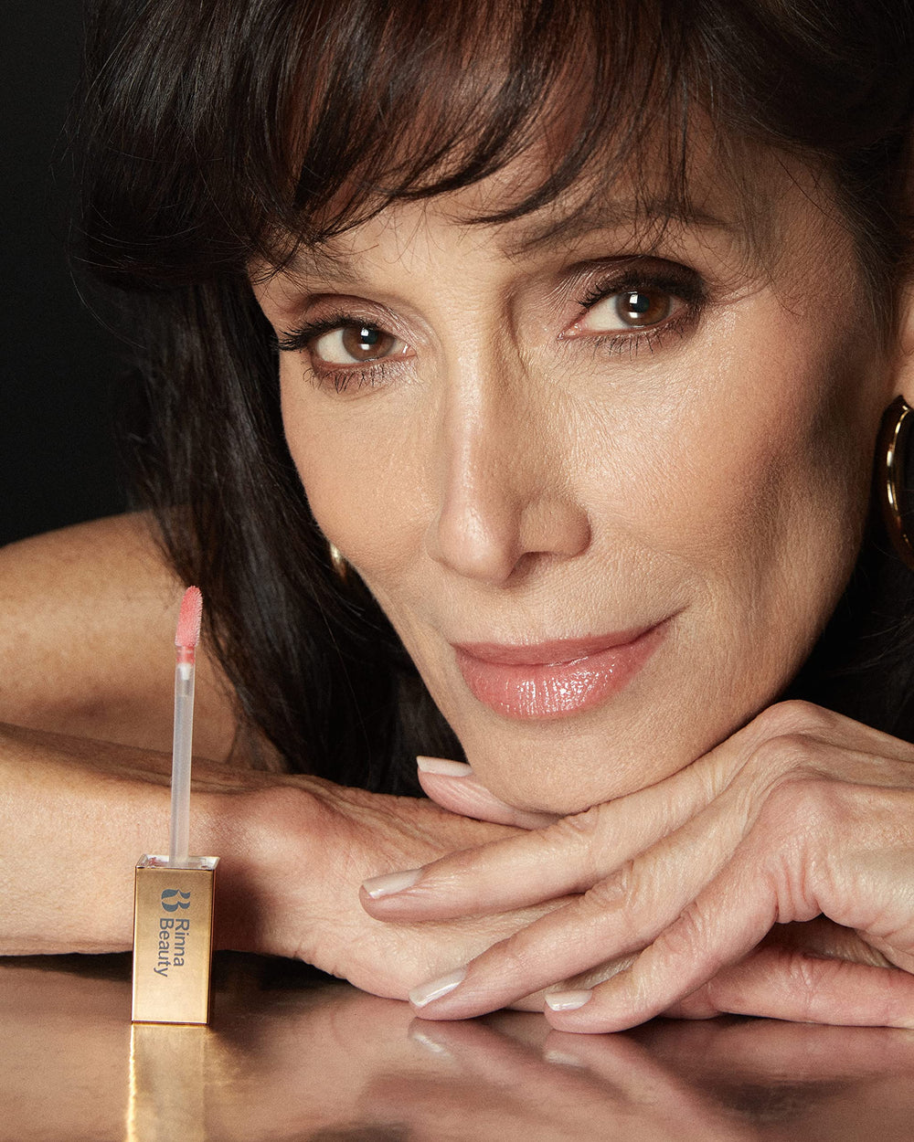 Cruelty-free lip gloss showcased in a sleek, premium tube.