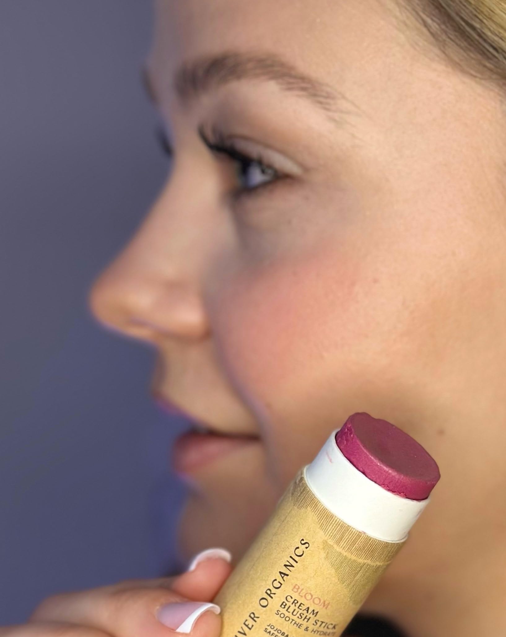River Organics blush stick swatch on forearm showing buildable color.