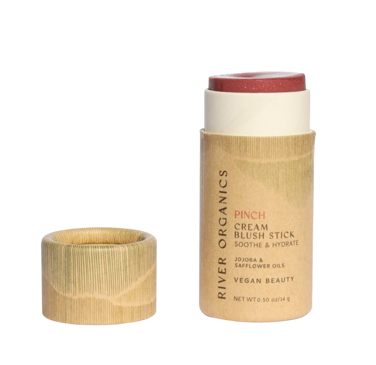 River Organics vegan blush stick swatches on cheek for natural warmth and glow.