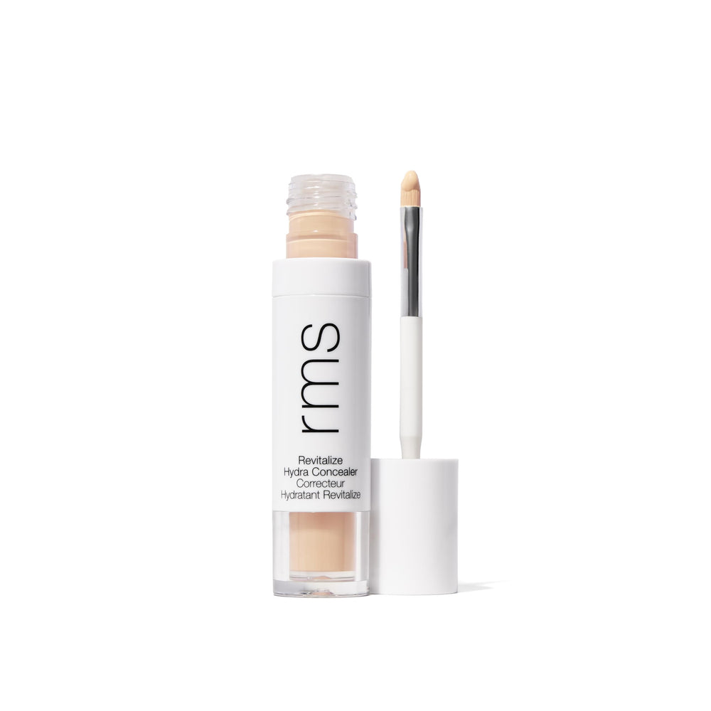 RMS Beauty Revitalize Hydra Concealer bottle with built-in brush for precise application.