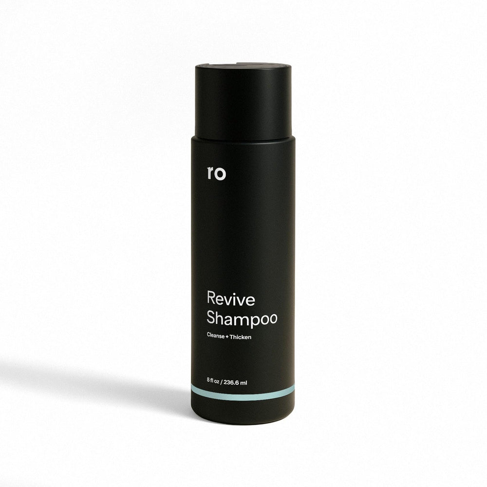 ro men's revive shampoo bottle with peppermint scent for a refreshing cleanse