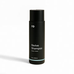 ro men's revive shampoo bottle with peppermint scent for a refreshing cleanse