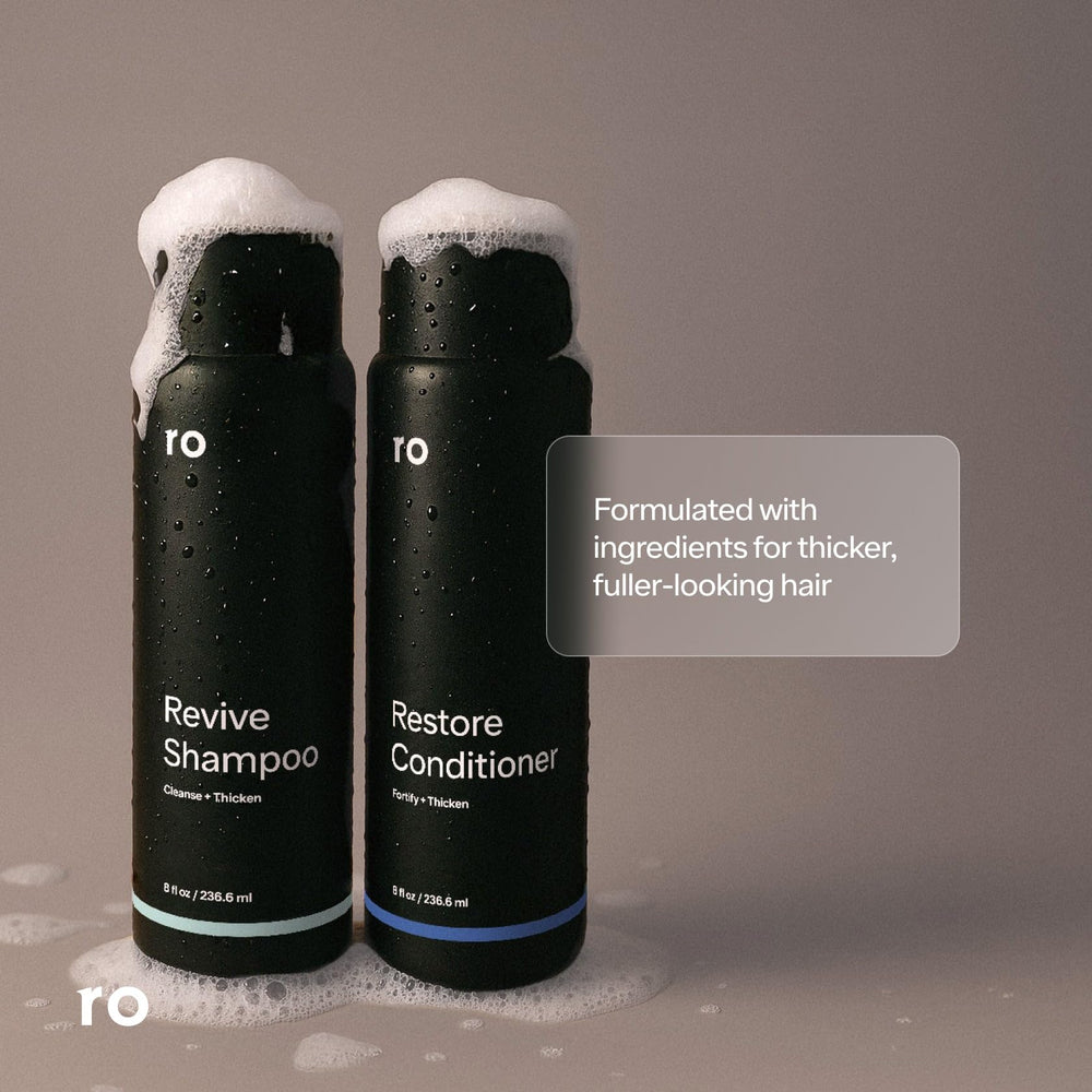 Ro Men's Revive Shampoo lather close-up highlighting clarifying exfoliation.
