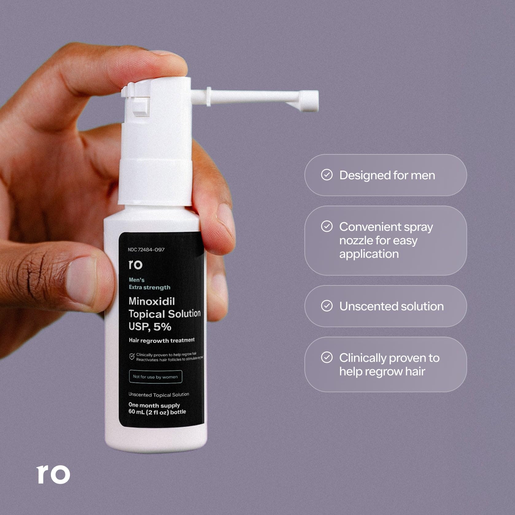 Ro Roman minoxidil application at the hairline demonstrating targeted thinning support