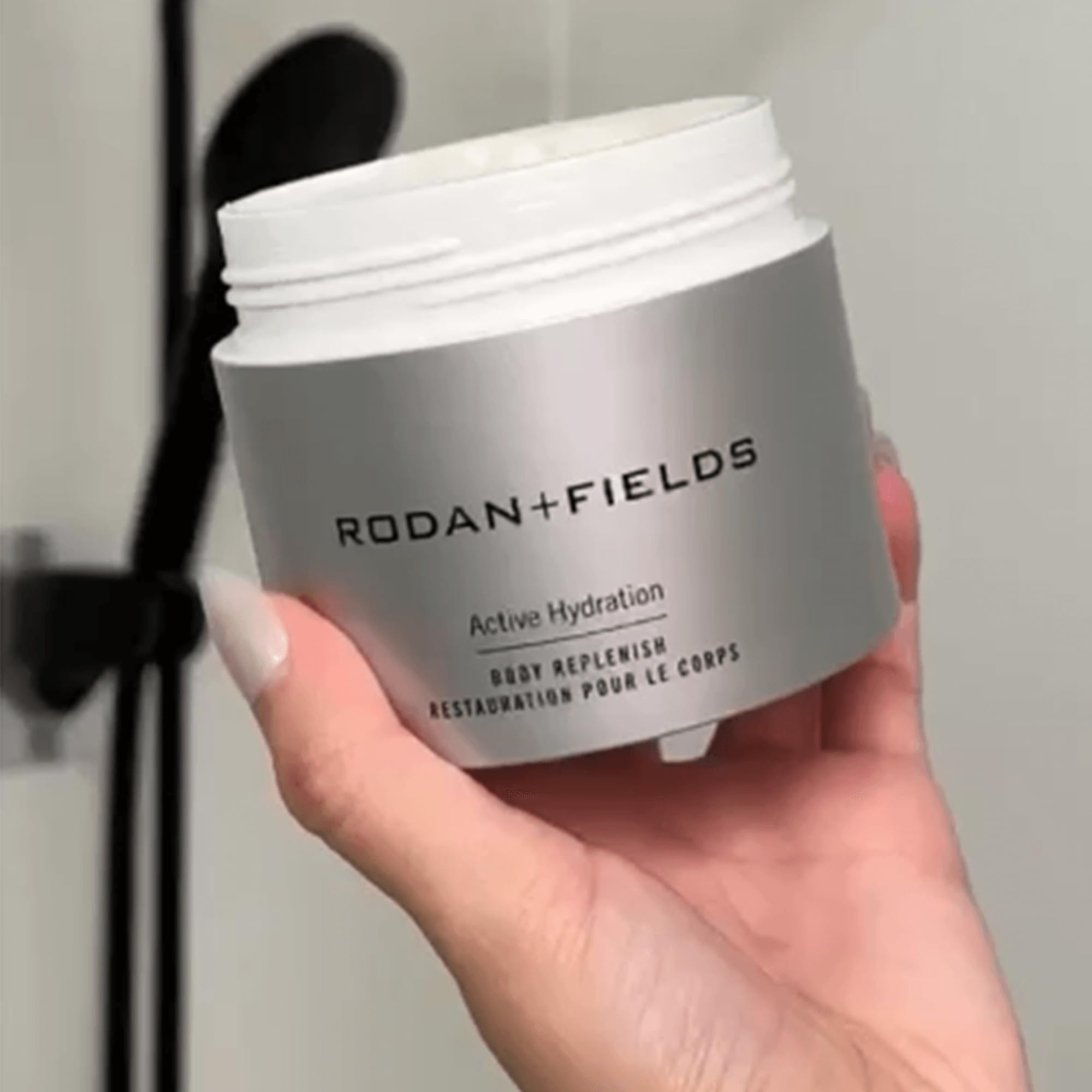 RODAN + FIELDS Active Hydration Body Replenish closeup texture shows smooth, non-greasy finish.