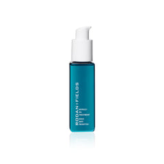 RODAN + FIELDS Defrizz Oil Treatment bottle closeup showing lightweight hydration