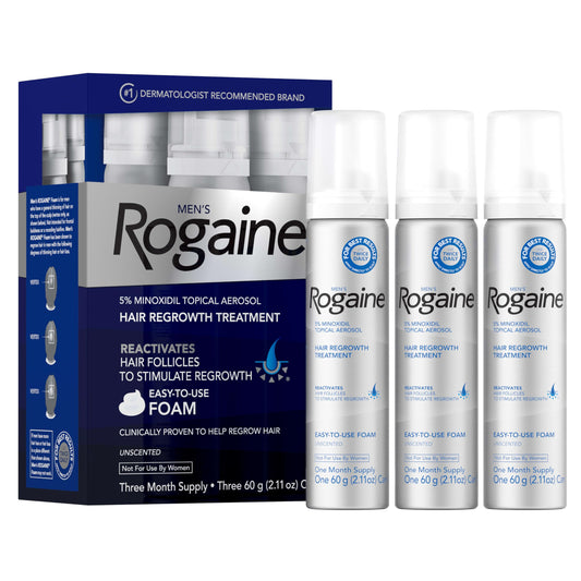 Rogaine men’s 5% foam bottle for at-home hair regrowth treatment.