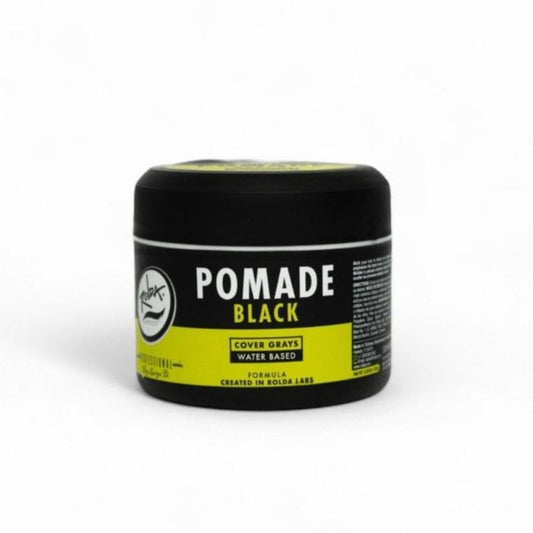 Rolda Black Pomade bottle close-up showing bold grey coverage potential.