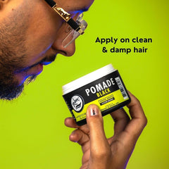 Rolda Black Pomade jar close-up highlighting smooth, non-greasy application.