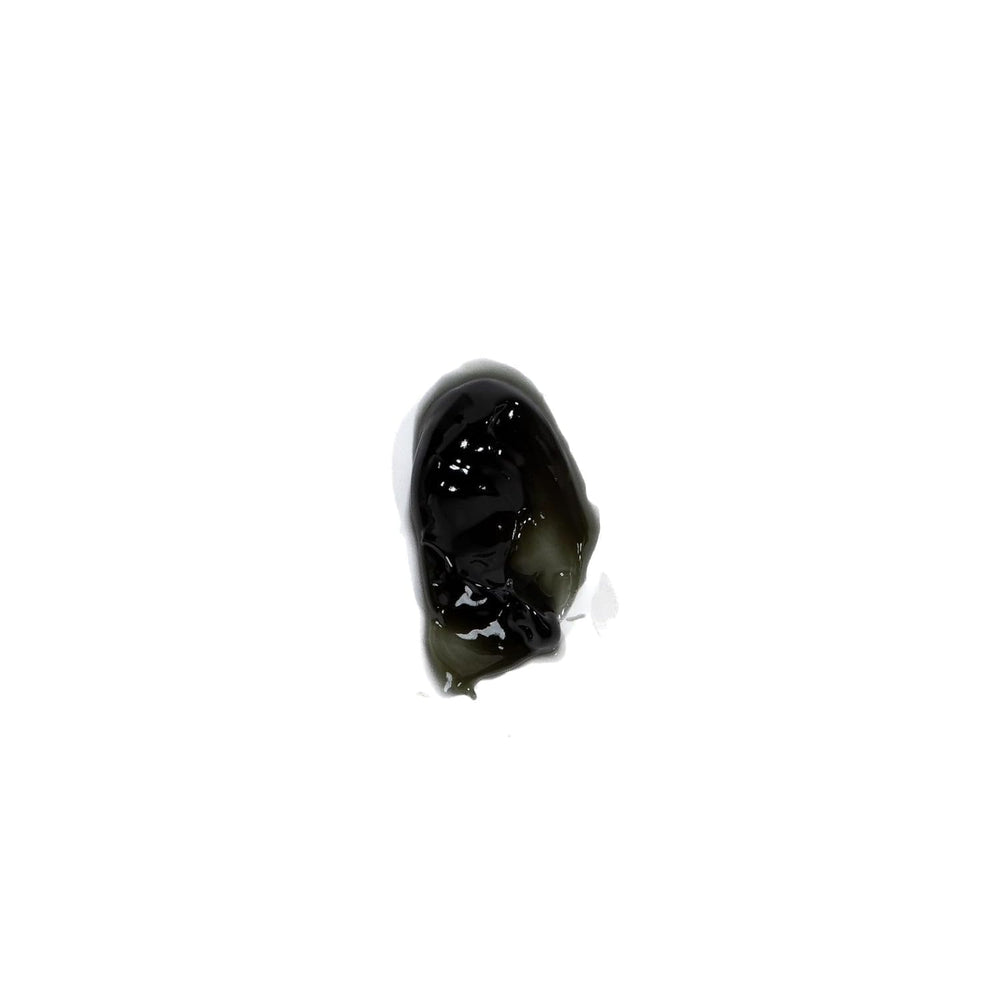Rolda black styling gel close-up of activated charcoal effect on hair nourishment