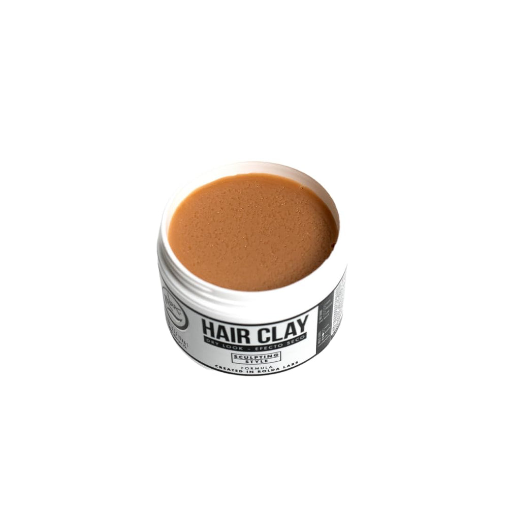 Rolda Hair Clay packaging on shelf emphasizes brand and size.
