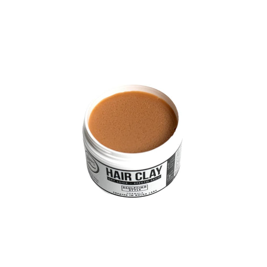 Rolda Hair Clay packaging on shelf emphasizes brand and size.
