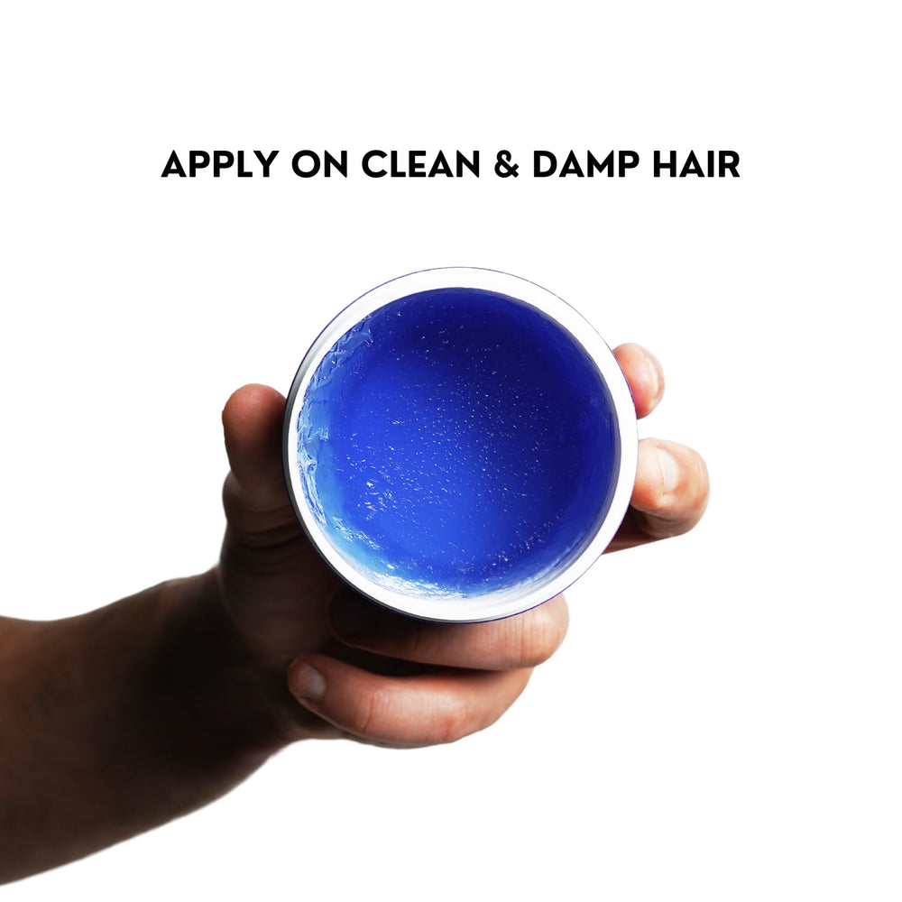Styled hair with Rolda Midnight Hair Pomade demonstrates a polished wet look.