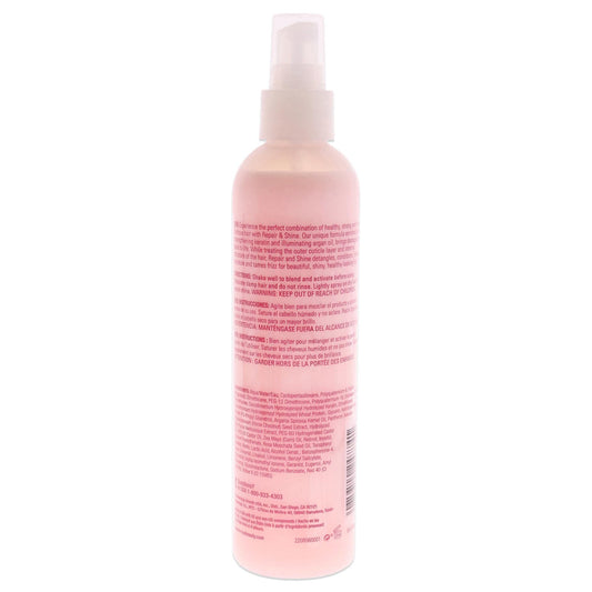Roux Argan Oil Keratin Repair Leave-in close-up showing detangling action and shine.
