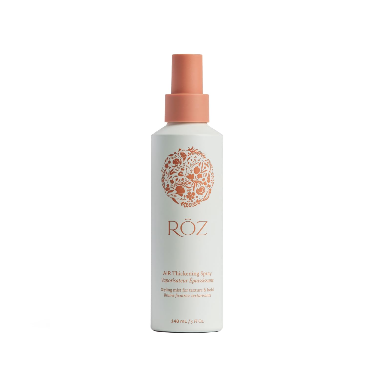 RŌZ Air Thickening Spray bottle closeup highlighting vegan formula and lightweight volume.