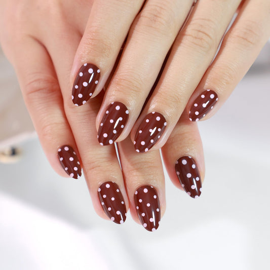 RPNZL Berry nails with red polka dot UV finish for at-home polish