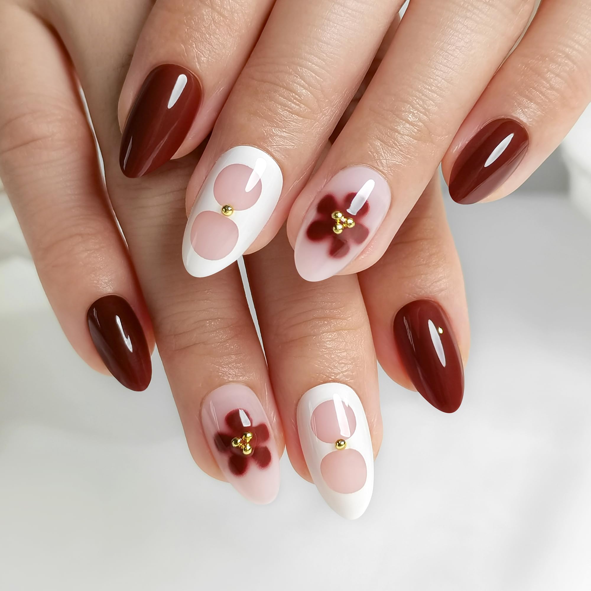 Close-up of glossy, chip-resistant finish on RPNZL Blossom nails.