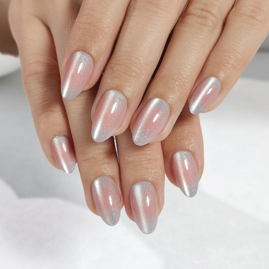 RPNZL Halo nails in white and pink cat eye with UV finish for at-home salon quality.
