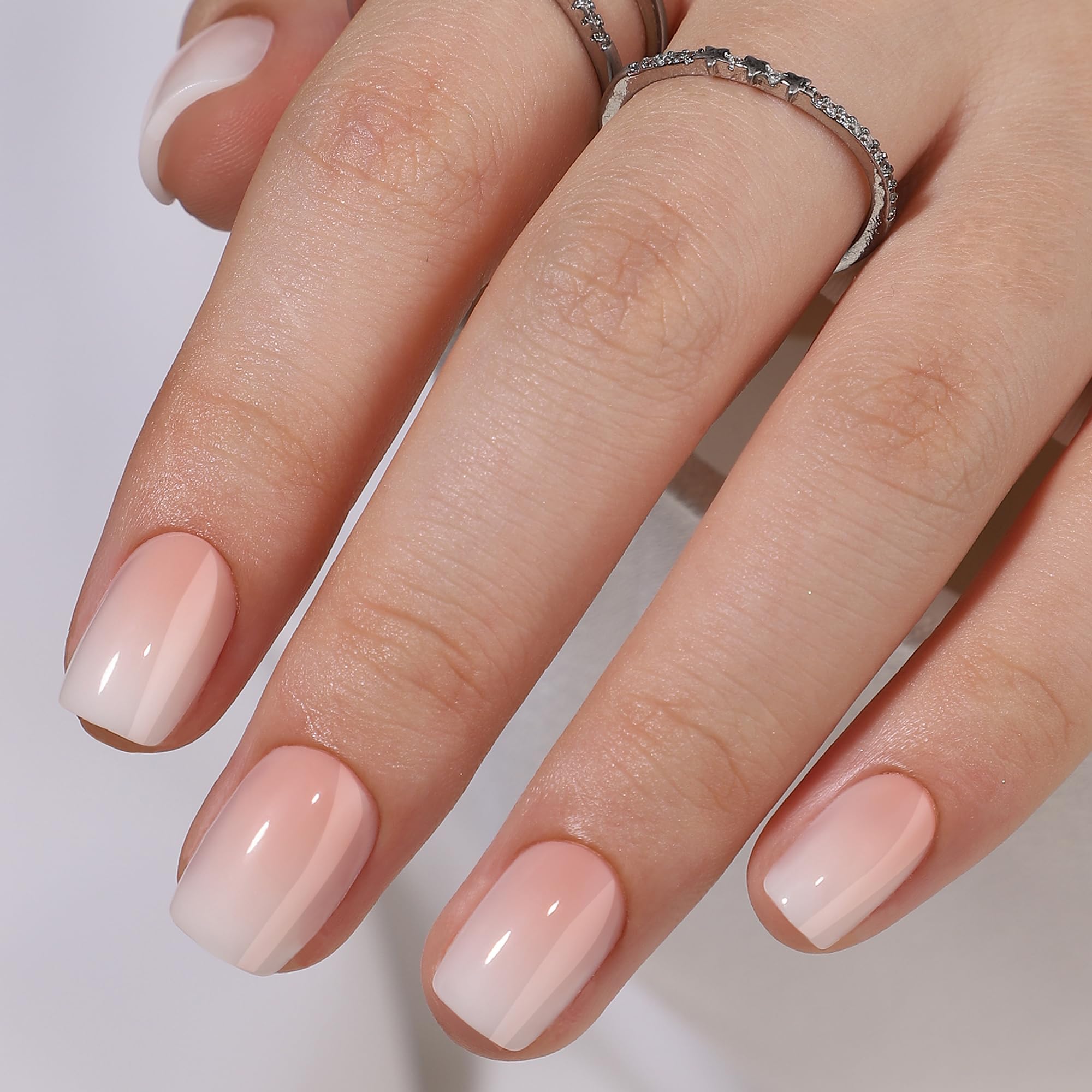 RPNZL Peach press-on nails short squoval display showing fit and style