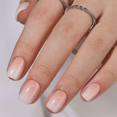 RPNZL Peach press-on nails short squoval display showing fit and style